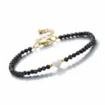 Czarny turmalin i serce z masy perłowej - bransoletka